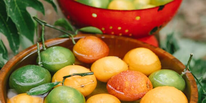 Fresh fruits in bowls with clear water