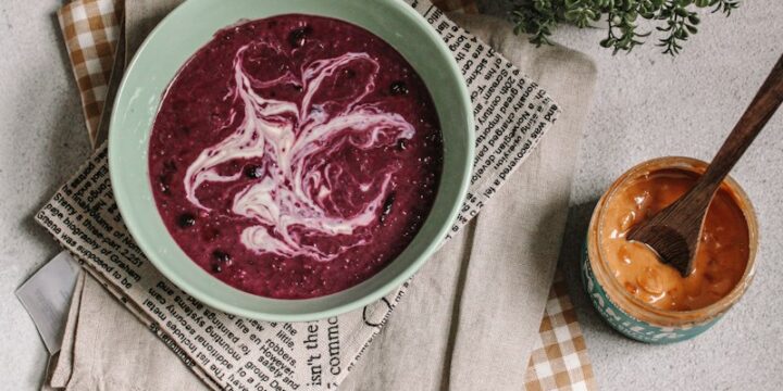 red soup in white ceramic bowl