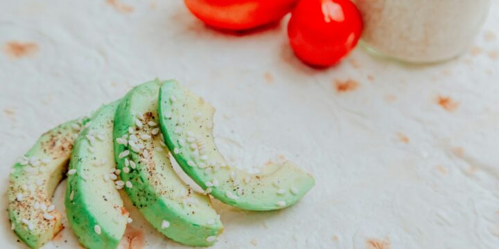 sliced cucumber on white surface