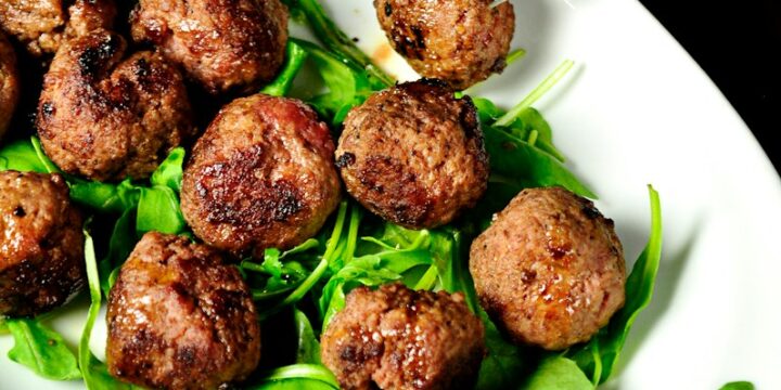 meat balls on oval white plate