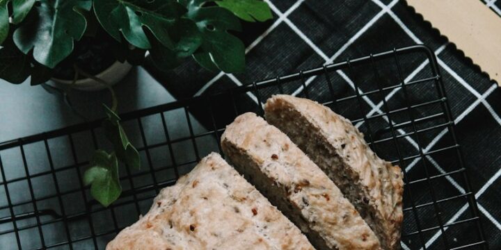 brown bread on black metal grill