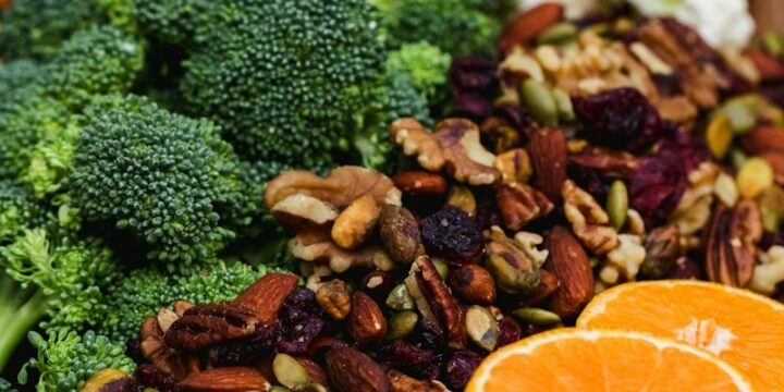 sliced orange fruit and green broccoli