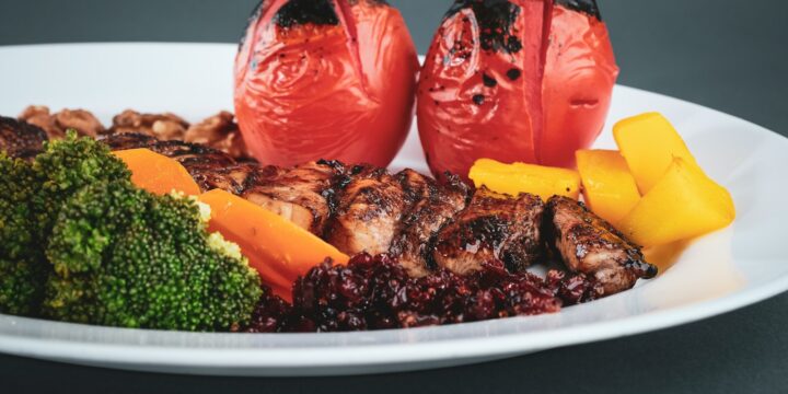 sliced fruits on white ceramic plate