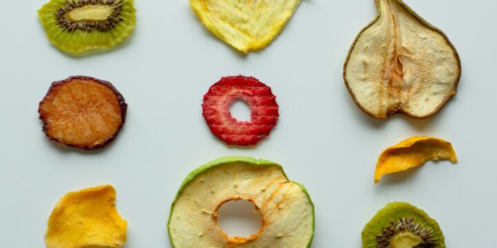 sliced apple and red round fruit